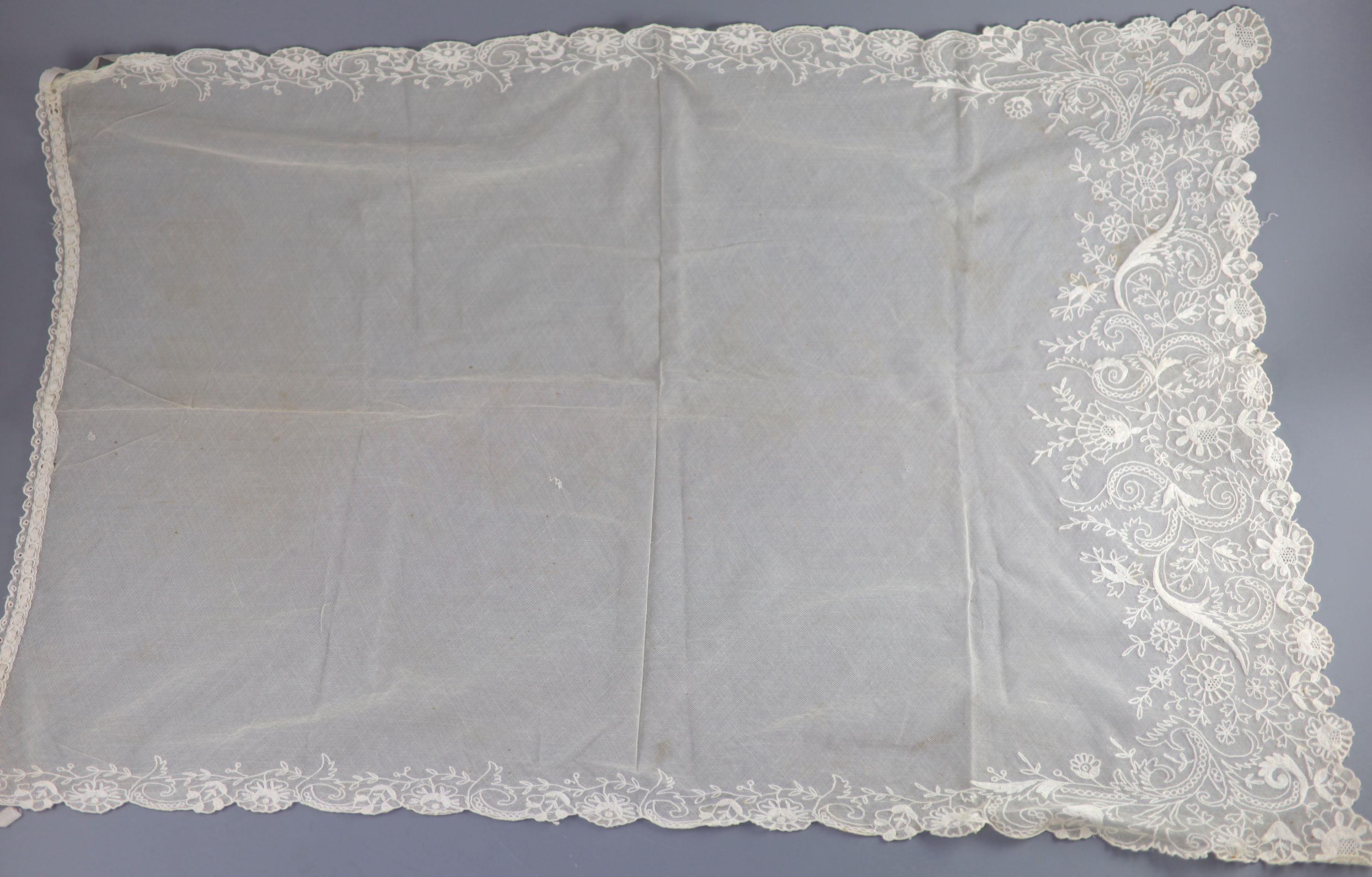 A 19th century needle-run bonnet veil, a French lace ruffed bobbin collar and two filet panels